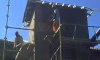 Haus verputzen in Afrika
