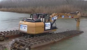 Schwimmender Bagger