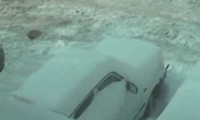 Auto vom Schnee befreien