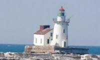 Ein Leuchtturm im Eismantel