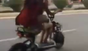 Two Girls one Scooter
